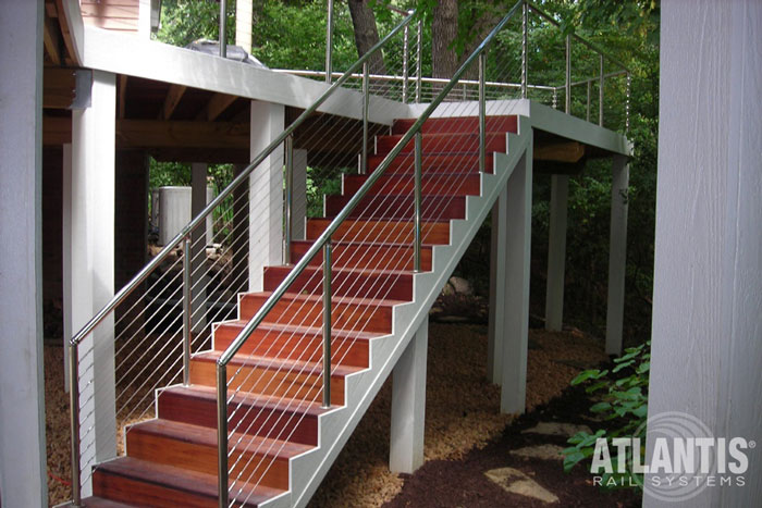 Cable railing on an outdoor staircase.