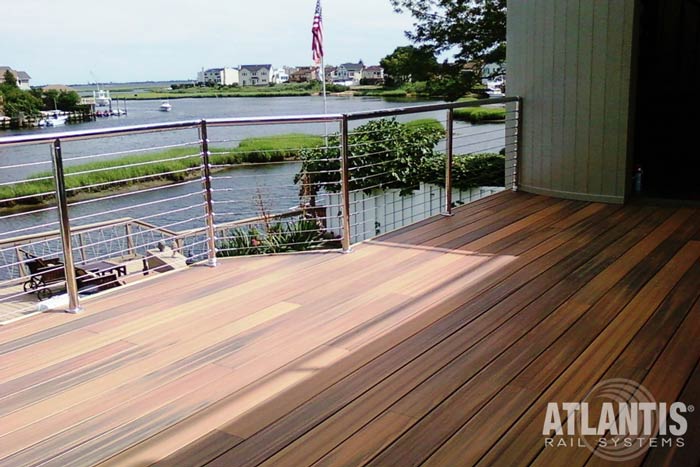 Minimalist-Cable-Railing-on-a-Multi-Colored-Deck.