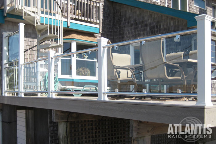 Glass infill on a deck cable railing system.